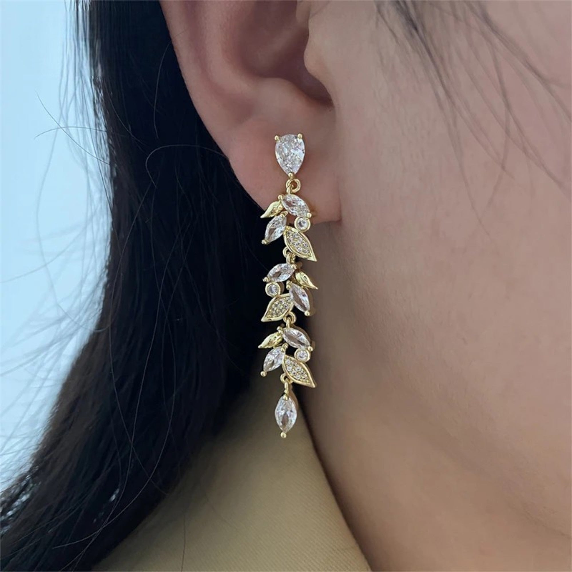 Boucles d’oreilles feuille dorée